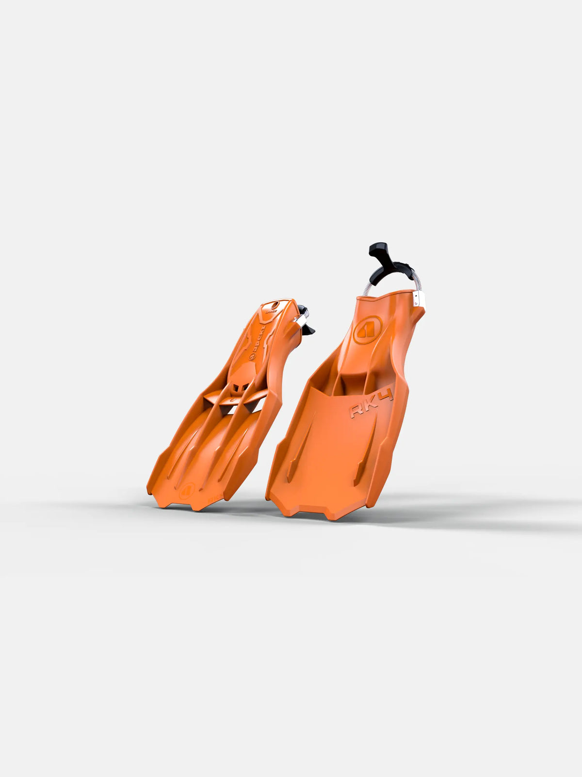 A pair of orange Apeks RK4 dive fins with stainless-steel spring straps